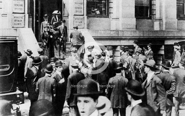 Anxious crowds outside the White Star Line office, 1912 (1937). Artist: Sport & General