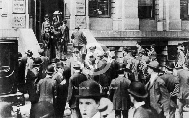 Anxious crowds outside the White Star Line office, 1912 (1937). Artist: Sport & General