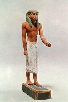 Ancient Egyptian figure of a merchant dignitary