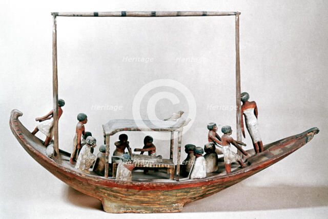 Ancient Egyptian model of a boat carrying a mummy to its tomb. Artist: Unknown