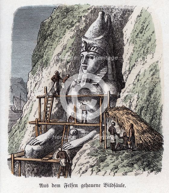 Ancient History. Egypt. Statue carved on a rock. German engraving, 1865.