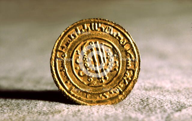 Andalusian gold dinar, also called 'Mancuso', used in Catalan counties during feudal times.