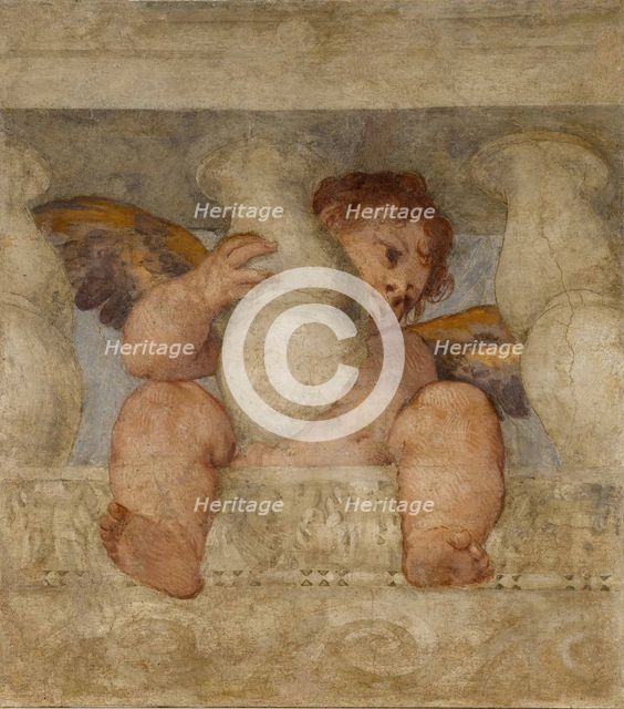 Angel seated on a balustrade.