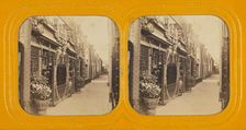 Angled view of a row of shops, about 1860. Creator: Unknown