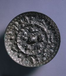 Animal-and-Grape Mirror with a Variety of Birds, late 600s. Creator: Unknown