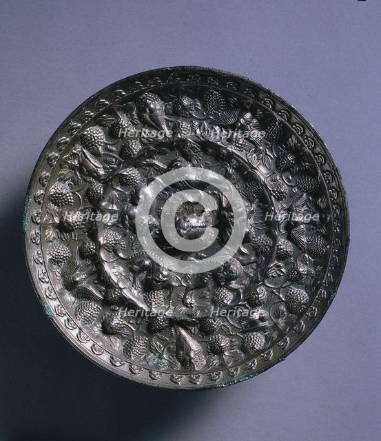 Animal-and-Grape Mirror with a Variety of Birds, late 600s. Creator: Unknown.