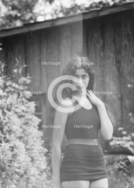 Anisfeld, Miss, standing outdoors, 1928 July 15. Creator: Arnold Genthe.