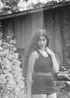 Anisfeld, Miss, standing outdoors, 1928 July 15. Creator: Arnold Genthe