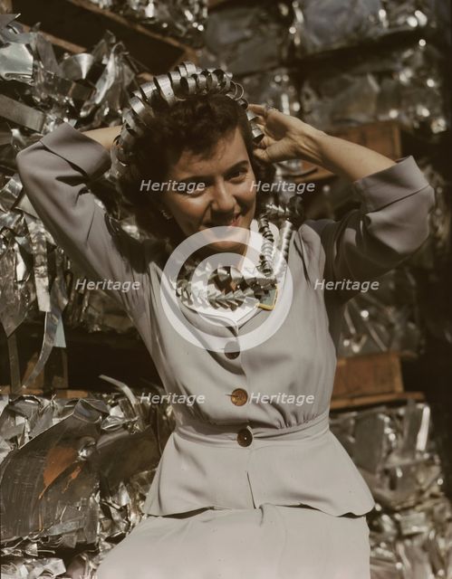 Annette del Sur publicizing salvage campaign...Douglas Aircraft Company, Long Beach, Calif., 1942. Creator: Alfred T Palmer.