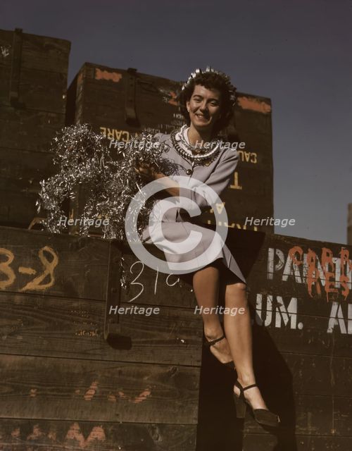 Annette del Sur publicizing salvage campaign...Douglas Aircraft Company, Long Beach, Calif., 1942. Creator: Alfred T Palmer.