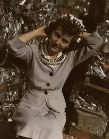 Annette del Sur publicizing salvage campaign...Douglas Aircraft Company, Long Beach, Calif., 1942. Creator: Alfred T Palmer