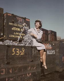 Annette del Sur publicizing salvage campaign...Douglas Aircraft Company, Long Beach, Calif., 1942. Creator: Alfred T Palmer