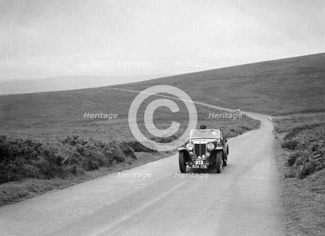 AB Langley's MG Magnette competing at the MCC Torquay Rally, July 1937. Artist: Bill Brunell.