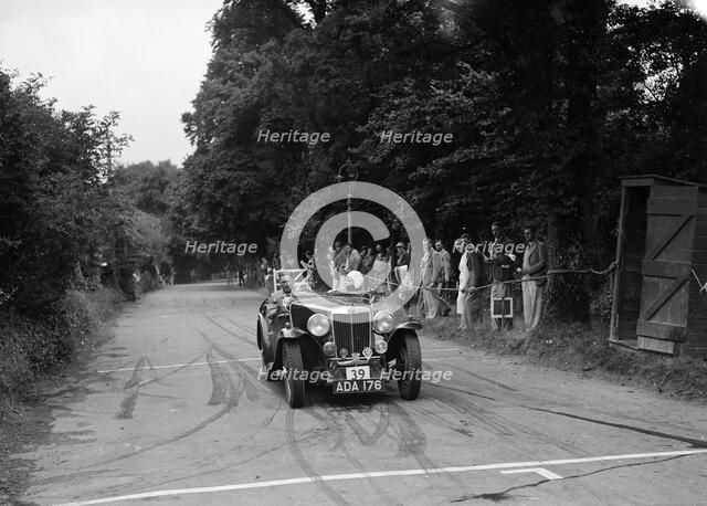 AB Langley's MG Magnette competing at the MCC Torquay Rally, July 1937. Artist: Bill Brunell.