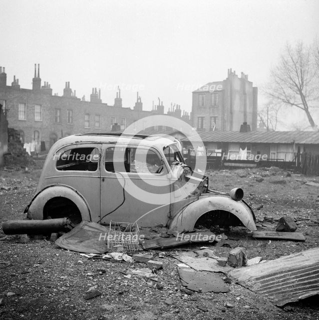 Abandoned car, London, 1960-1965. Artist: John Gay