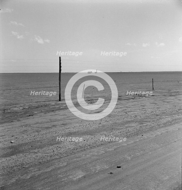 Abandoned farm on the high plains, Texas County, Oklahoma, 1938. Creator: Dorothea Lange.