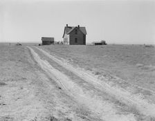 Abandoned farmhouse in Columbia Basin, one mile east of Quincy, Grant County, Washington, 1939. Creator: Dorothea Lange