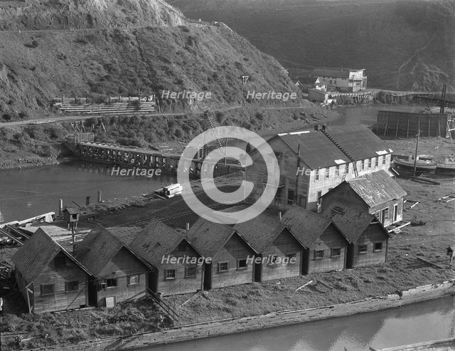 Abandoned lumber town showing mill and houses, Mendocino County, California, 1938. Creator: Dorothea Lange.