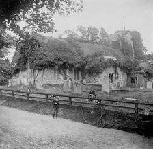 Abandoned stone church and penny-farthing bicycle, 1898. Creator: Robert Augustus Henry L'Estrange