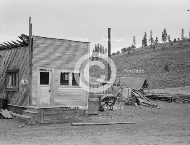 Abandoned sawmill in nearly deserted town, Tamarack, Adams County, Idaho, 1939. Creator: Dorothea Lange.