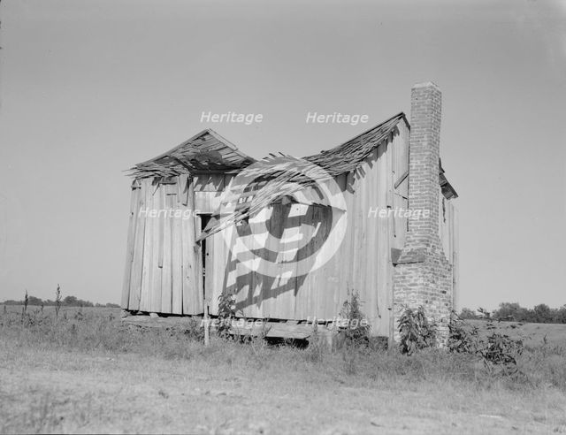 Abandoned tenant cabin of the Mississippi Delta, 1937. Creator: Dorothea Lange.