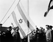 Abba Eban (1915-2002), at the raising of the Israeli flag at UN, 1949. Creator: Unknown