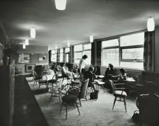 Abbey Wood County High School, Woolwich, London: teachers relaxing in the staff room, 1962. Creator: Unknown