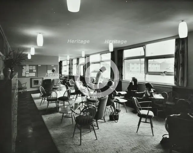 Abbey Wood County High School, Woolwich, London: teachers relaxing in the staff room, 1962. Creator: Unknown.