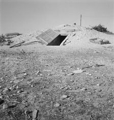 Abode basement dugout house on Roberts farm, Willow Creek area, Oregon, 1939. Creator: Dorothea Lange