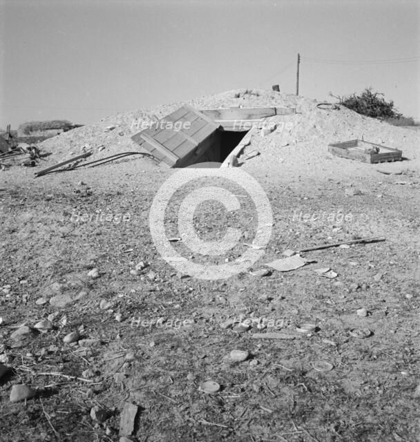 Abode basement dugout house on Roberts' farm, Willow Creek area, Oregon, 1939. Creator: Dorothea Lange.
