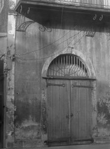 Absinthe House entrance, New Orleans, between 1920 and 1926. Creator: Arnold Genthe