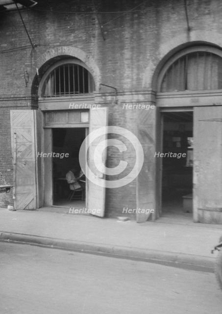 Absinthe House entrance, New Orleans, between 1920 and 1926. Creator: Arnold Genthe.