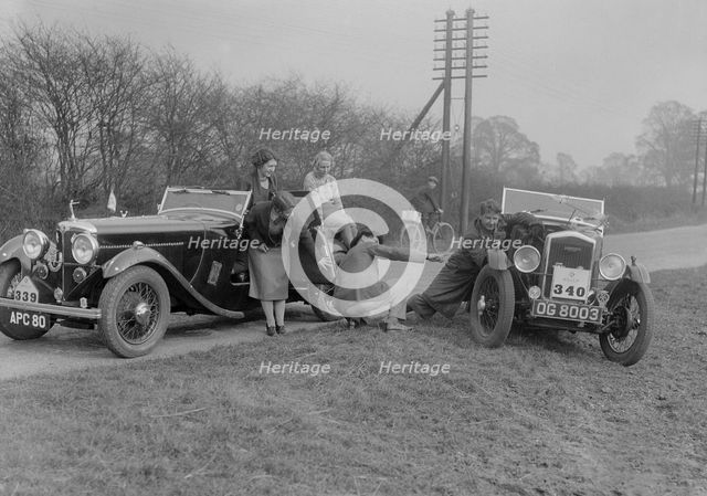 AC 4-seater tourer of Kitty Brunell and a Wolseley Hornet at the RAC Rally, 1933. Artist: Bill Brunell.