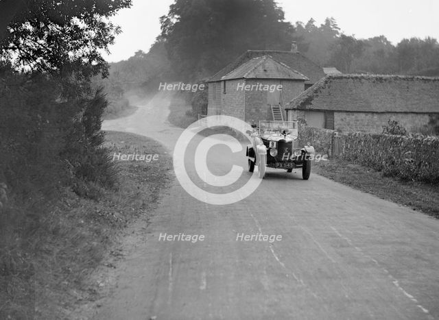 AC open 4-seater competing in the Brighton & Hove Motor Club Trial, 1920s. Artist: Bill Brunell.