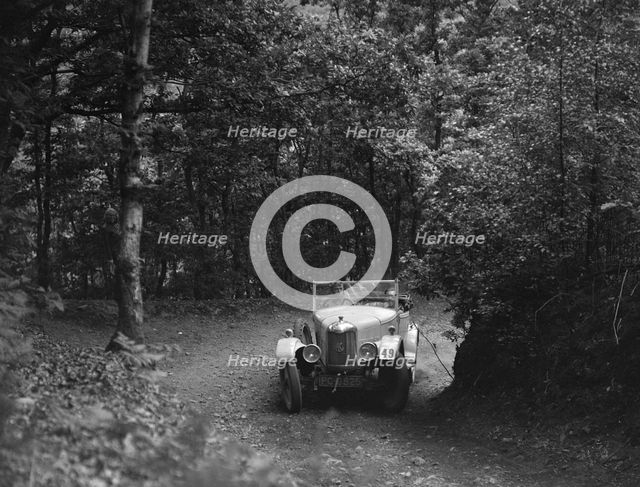 AC taking part in a motoring trial, c1930s. Artist: Bill Brunell.