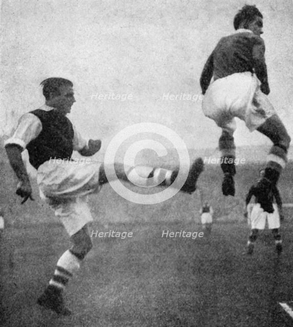 Action from an Arsenal v Chelsea football match, c1936-c1944. Artist: Sport & General