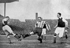 Action from an Arsenal v Sheffield United football match, c1927-1937.Artist: London News Agency