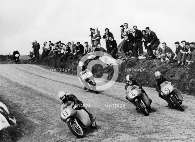 Action from the Lightweight TT race, Isle of Man, 1958. Artist: Unknown