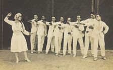 Actors, one in drag, performing on stage as "The Curios", c1918-1920. Creator: Unknown