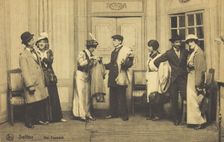 Actors, some in drag, performing at a prisoner of war camp in Belgium, (between 1910 and 1919?). Creator: Unknown