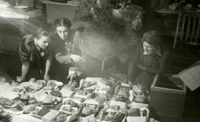 Actresses of the Moscow Art Theatre preparing presents for the Red Army, USSR, 1943. Artist: Anon
