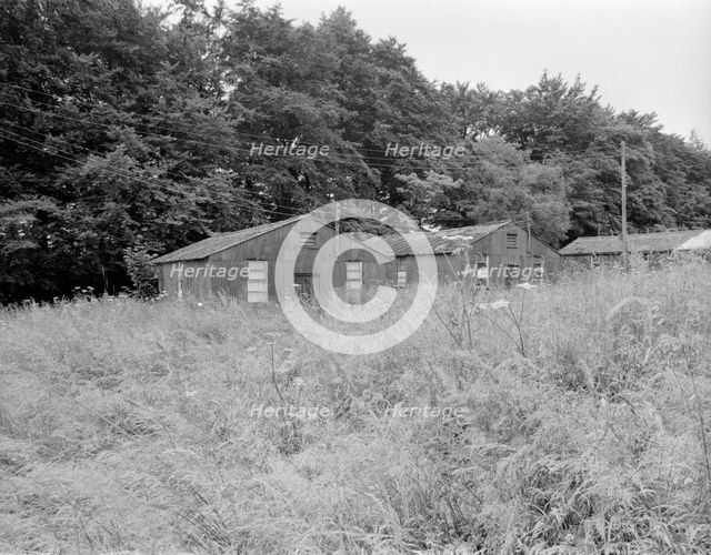 Accommodation huts in Greenaway Lane, Ullenwood, Gloucestershire, 1999. Artist: EH/RCHME staff photographer