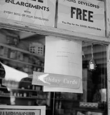 Across the counter is Ghost Town Café, Vader, Lewis County, Western Washington, 1939. Creator: Dorothea Lange