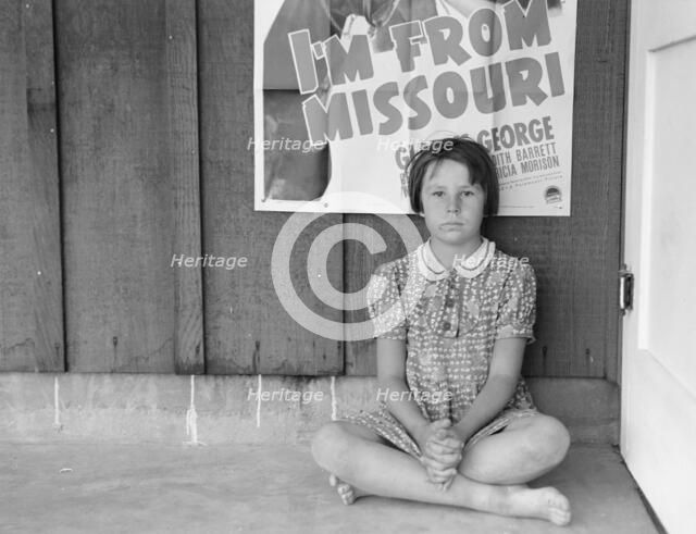 Advertisement for current movie in town, Westley, California, 1939. Creator: Dorothea Lange.