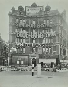 Advertisements at Cambridge Circus, Westminster, London, 1945