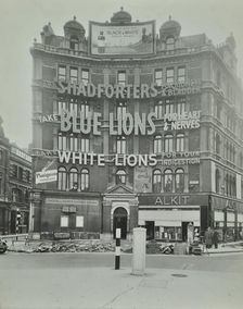 Advertisements at Cambridge Circus, Westminster, London, 1945