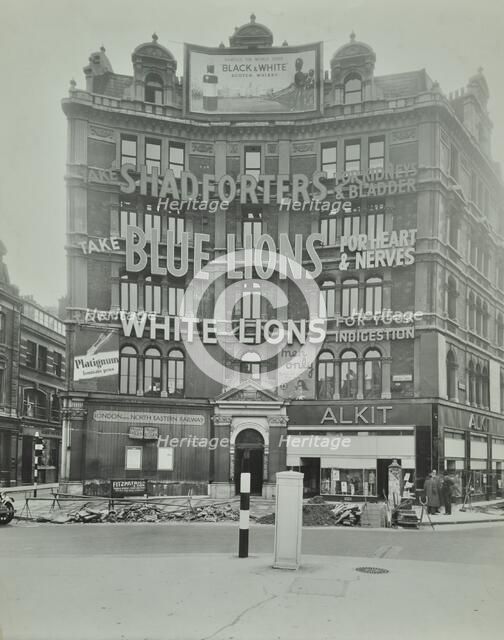 Advertisements at Cambridge Circus, Westminster, London, 1945. Artist: Unknown.