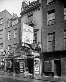 Advertisements at the Globe Theatre, Newcastle Street, London, 1902. Artist: Bedford Lemere and Company