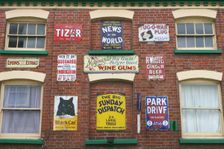 Advertisements on a building, Ross-on-Wye, Herefordshire. Creator: Peter Thompson