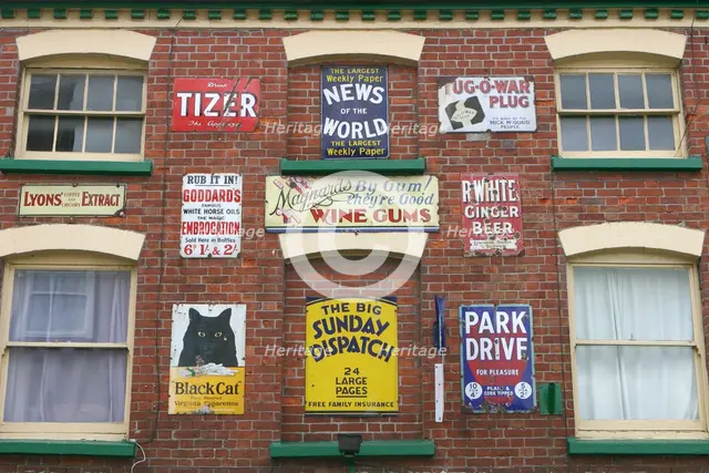 Advertisements on a building, Ross-on-Wye, Herefordshire. Creator: Peter Thompson.